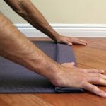 antranik-showing-a-wrist-modification-using-yoga-mat